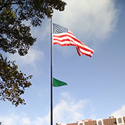 AQI flag flying in the blue sky